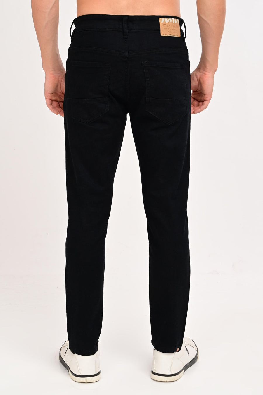 Back view of IVYN Arden Jet Black ankle-fit jeans