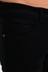Coin pocket, branded rivet and tonal stitching on IVYN Jet Black jeans