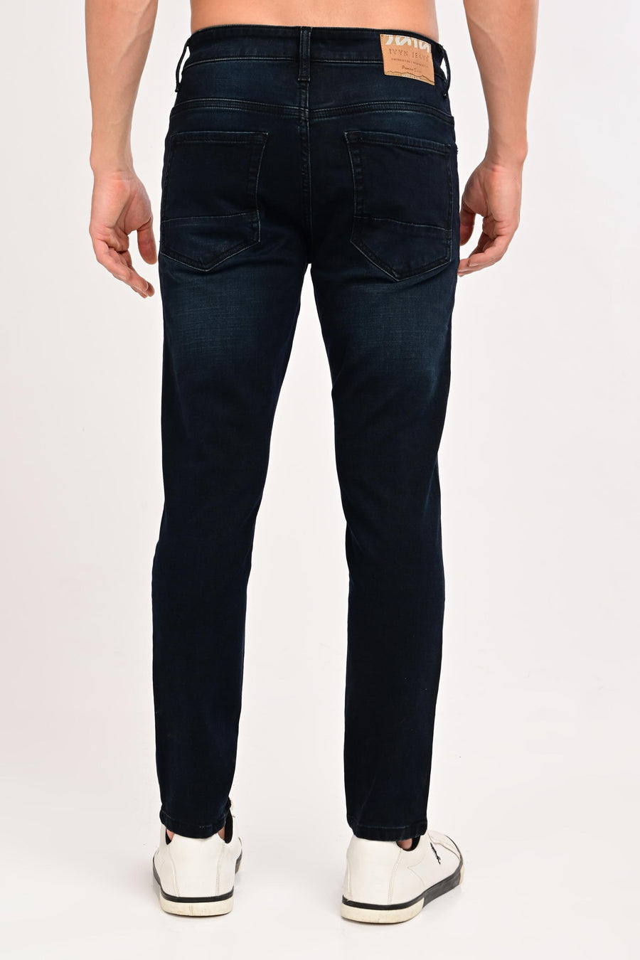 Back view of IVYN Arden Midnight Indigo Wash ankle-fit jeans