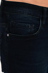 Coin pocket, branded rivet and tonal stitching on IVYN Midnight Indigo Wash jeans