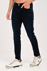 Three-quarter view of IVYN Arden Midnight Indigo Wash tapered jeans