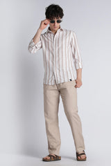 Full-length look featuring IVYN mushroom taupe linen-blend trousers