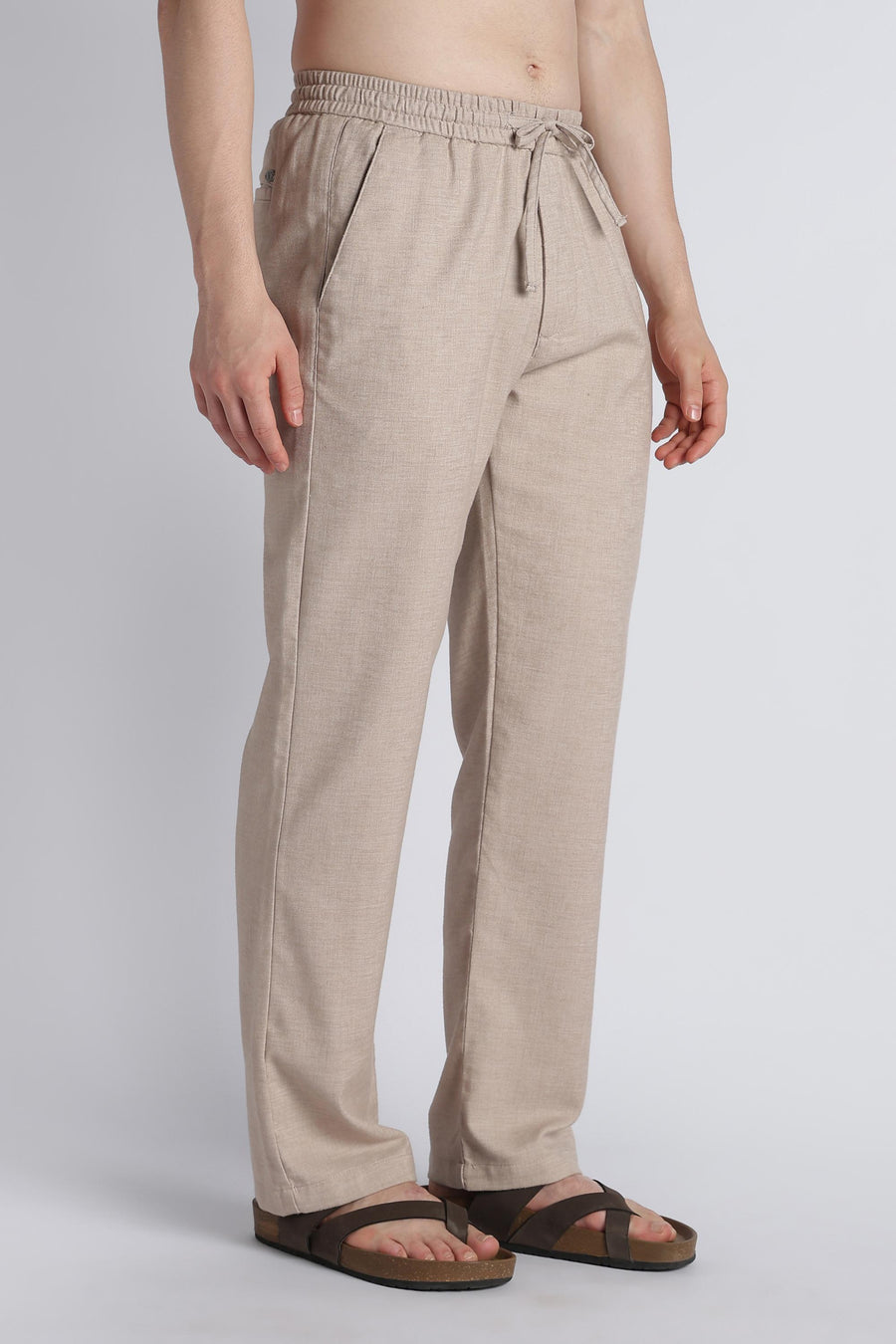 Relaxed front view of IVYN mushroom taupe linen-blend trousers