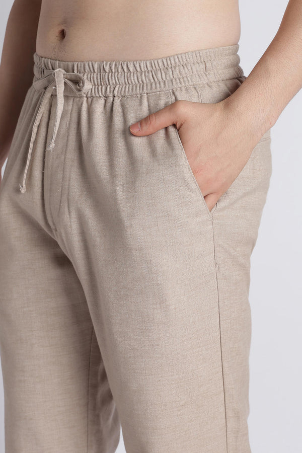 Side pocket and linen-blend fabric detail of IVYN mushroom taupe trousers