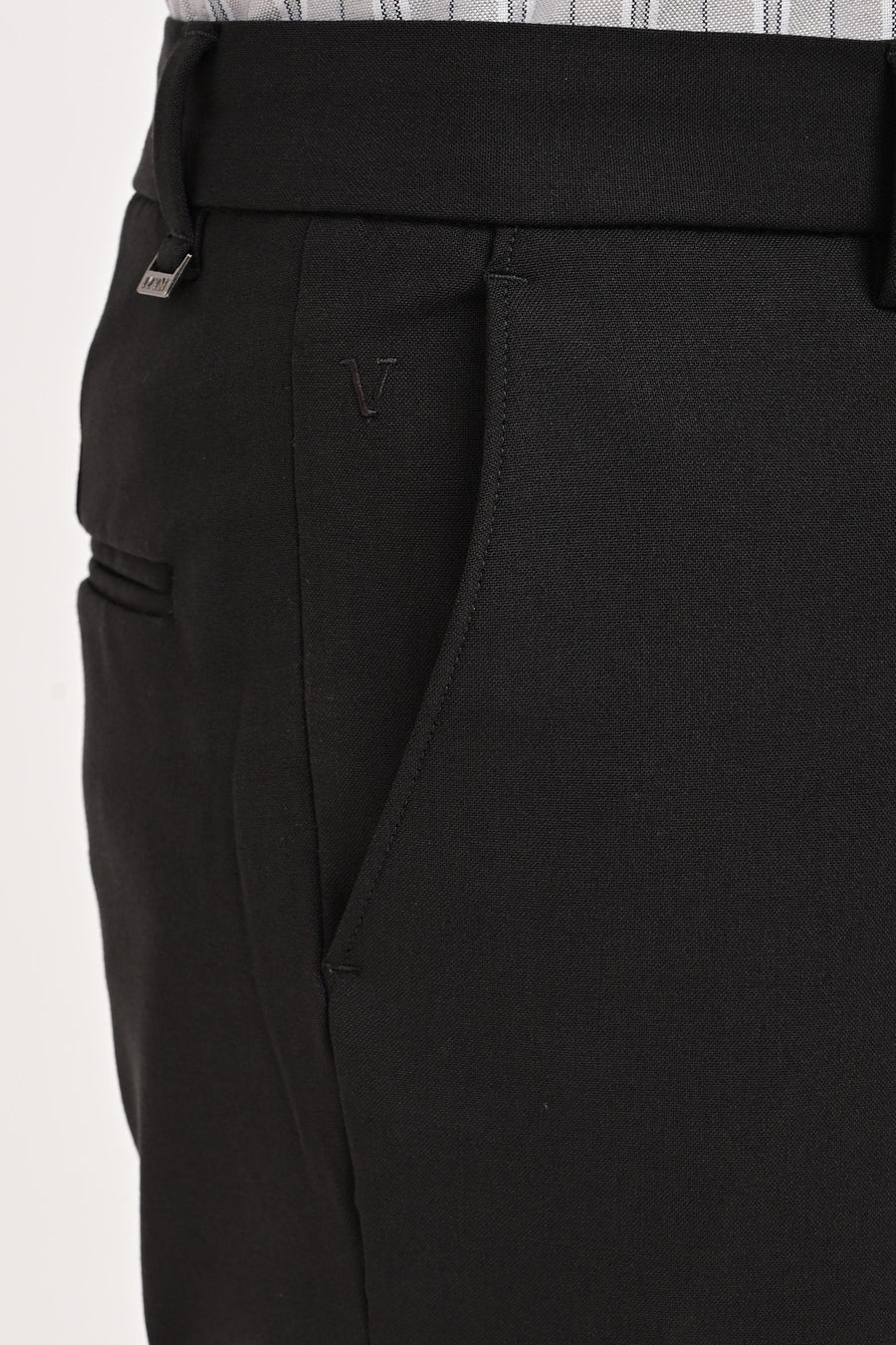 Angled pocket, tonal embroidery and IVYN metal detail on Charcoal trousers