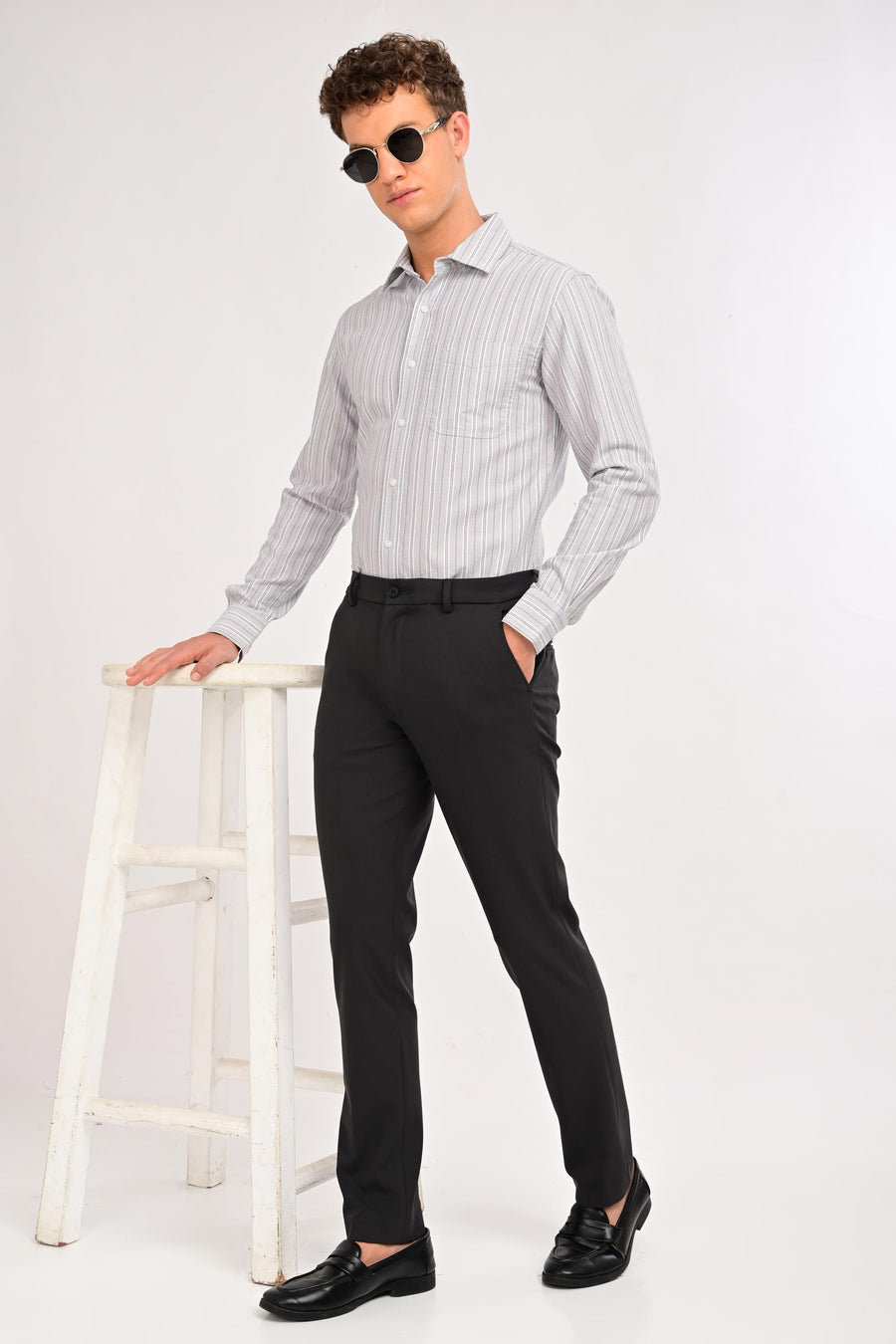 Three-quarter view of IVYN Regent Charcoal tailored formal trousers