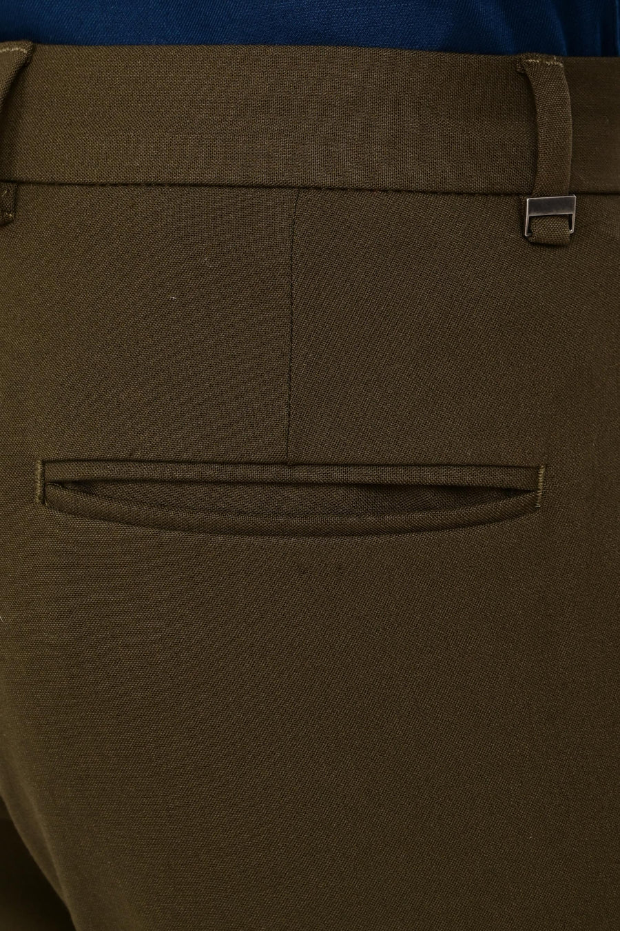 Rear welt pocket and IVYN metal detail on Deep Olive formal trousers