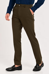 Three-quarter view of IVYN Regent Deep Olive tailored trousers