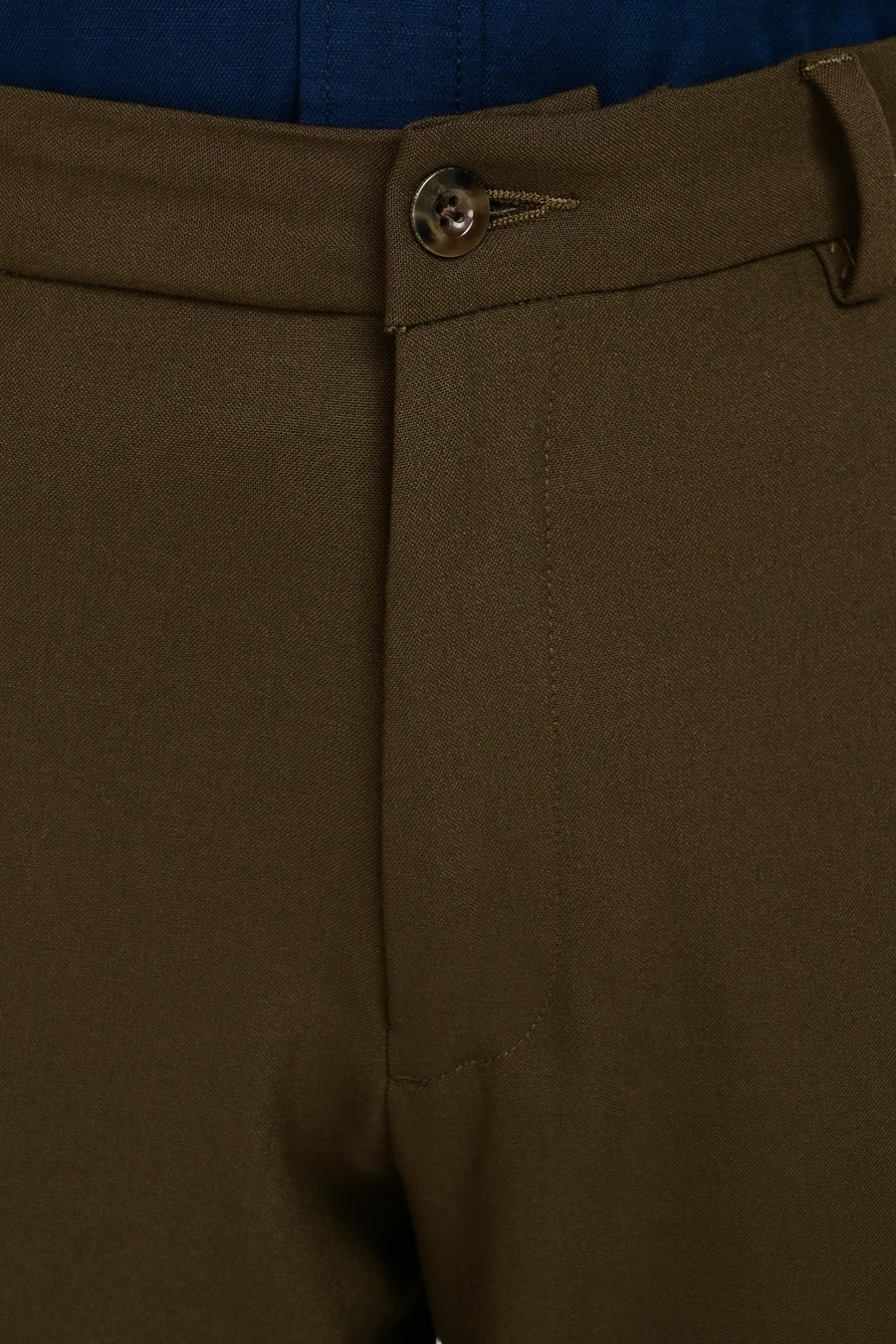 Waistband, button and concealed fly detail of IVYN Deep Olive trousers