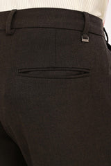 Rear welt pocket and IVYN metal detail on Espresso Melange trousers