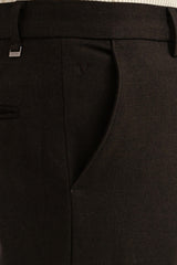 Angled pocket, tonal embroidery and IVYN metal detail on Espresso Melange trousers