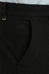 Angled pocket, tonal embroidery and IVYN metal detail on Graphite Melange trousers