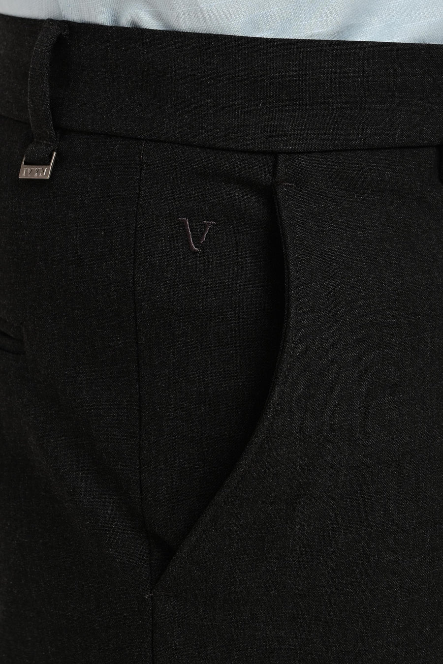 Angled pocket, tonal embroidery and IVYN metal detail on Graphite Melange trousers