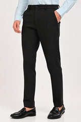 Three-quarter view of IVYN Regent Graphite Melange tailored trousers