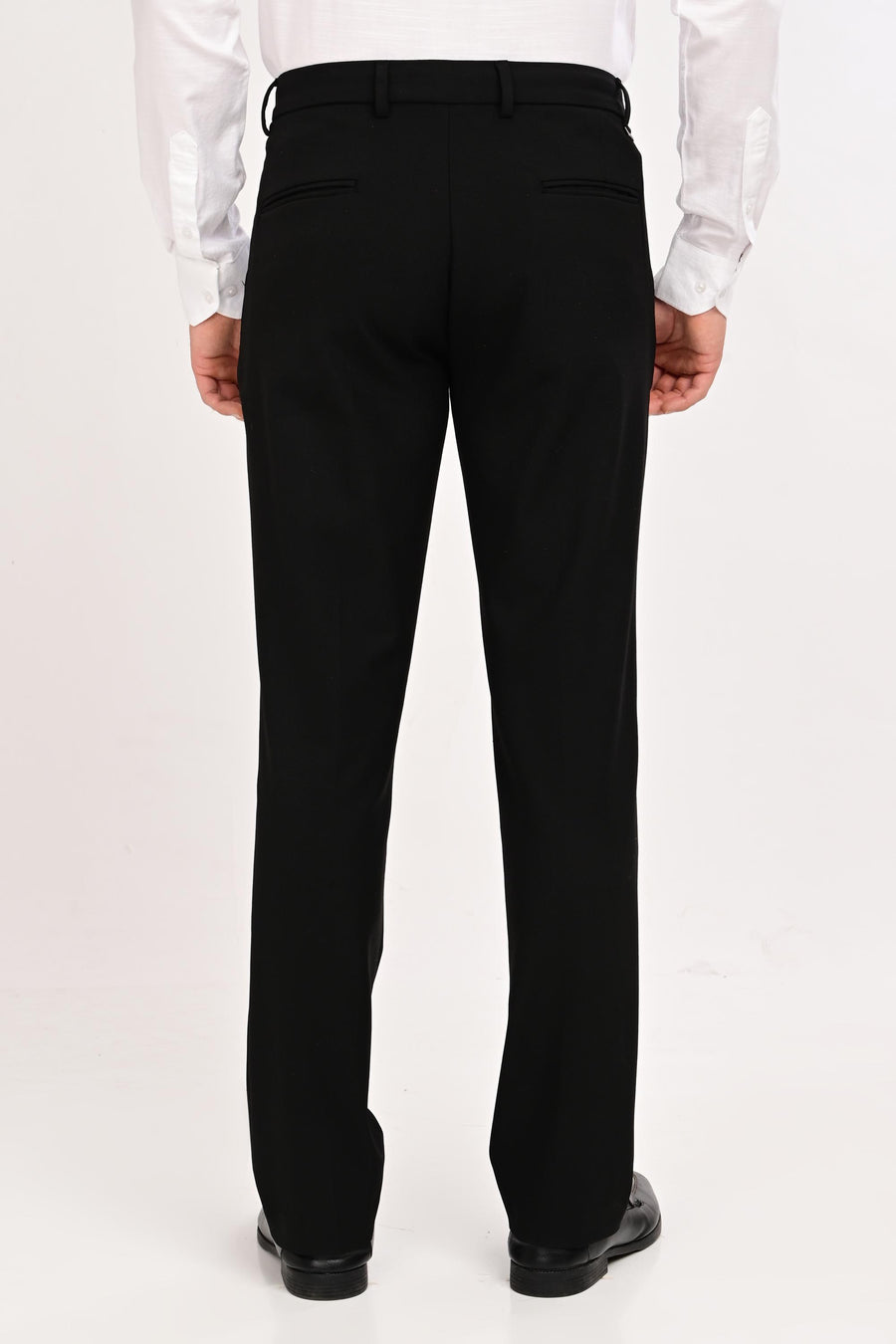 Back view of IVYN Regent Jet Black slim-fit formal trousers