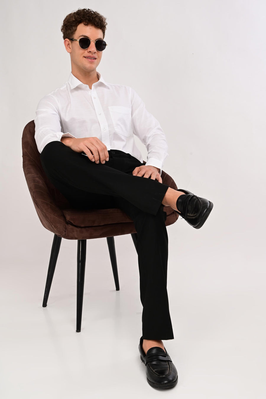 Seated formal look featuring IVYN Regent Jet Black tailored trousers