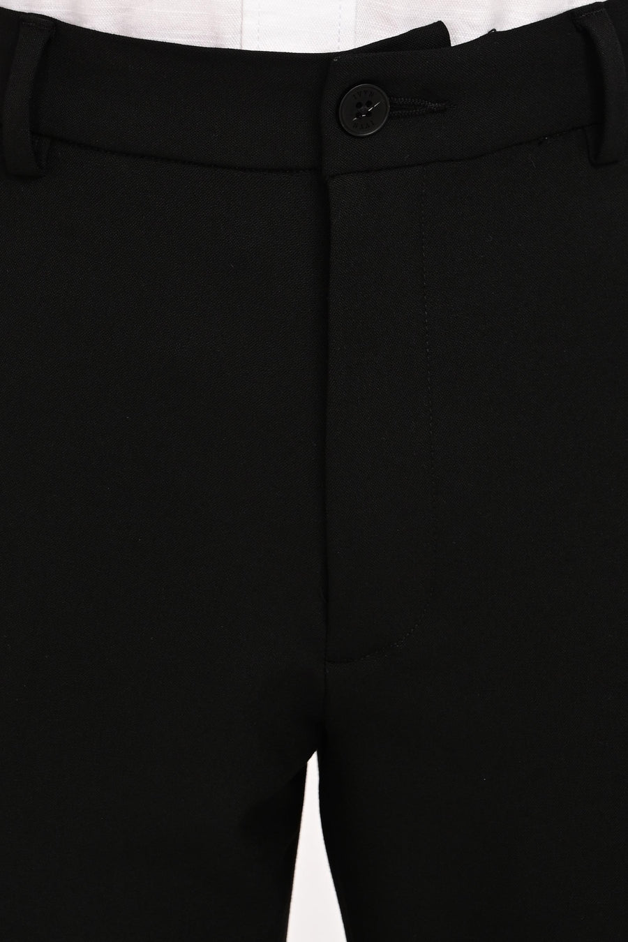 Waistband, button and concealed fly detail of IVYN Jet Black trousers