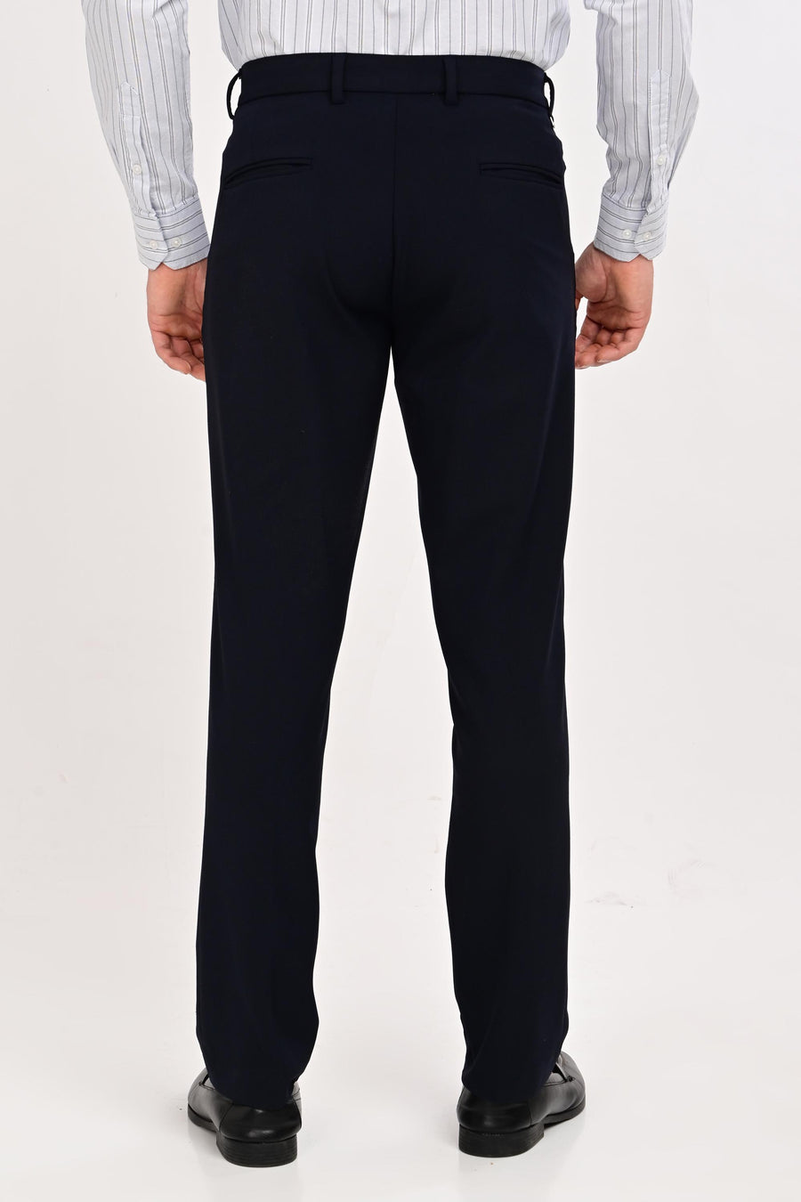 Back view of IVYN Regent Midnight Navy slim-fit formal trousers