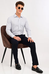Seated formal look featuring IVYN Regent Midnight Navy tailored trousers