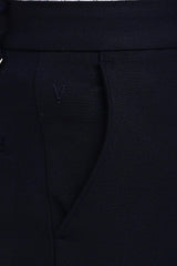 Angled pocket and tonal IVYN embroidery on Midnight Navy trousers