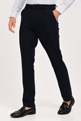 Three-quarter view of IVYN Regent Midnight Navy tailored trousers