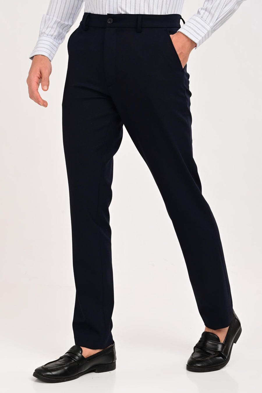 Three-quarter view of IVYN Regent Midnight Navy tailored trousers