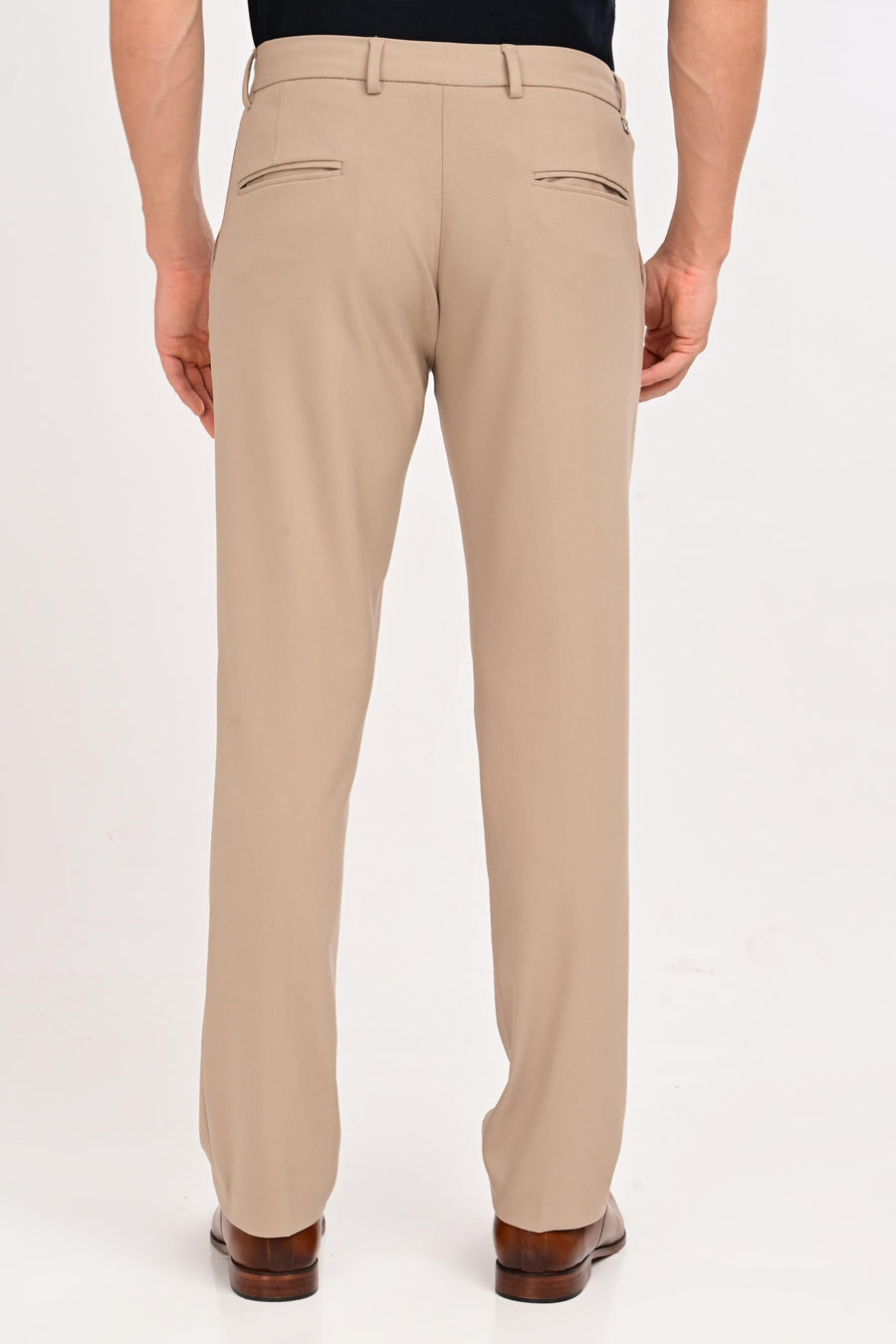 Back view of IVYN Regent mink beige slim-fit formal trousers
