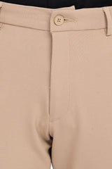 Waistband, button and concealed fly detail of IVYN Regent mink beige trousers